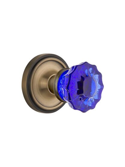 Classic Rosette Door Set with Colored Fluted Crystal Glass Knobs Cobalt Blue in Antique Brass.